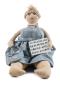 Preview: kantensitzer lady mit schild "schokolade löst keine probleme..." baden 2188834